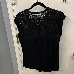 Sleeveless Black blouse w/details on front